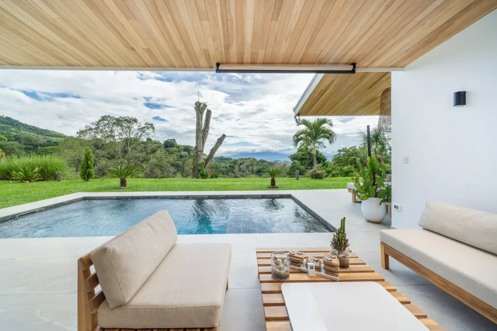 Modern patio with pool and mountain view